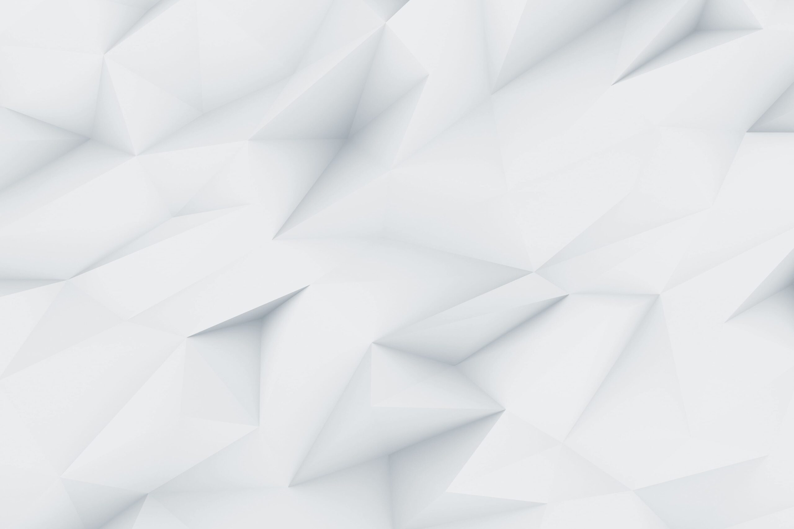 Light gray geometric pattern with overlapping faceted polygons and sharp edges.