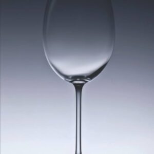 An empty glass poetry book paperback